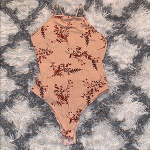 Floral pink body suit